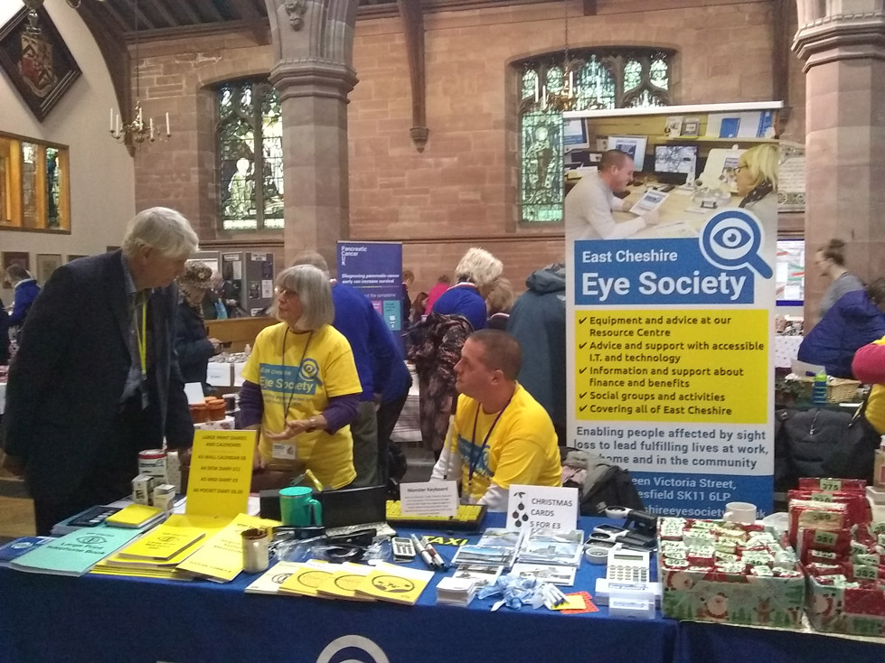 Trustees at an event selling products and giving out information