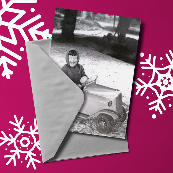 Mockup-2-WEB Christmas card with image of child playing in the snow